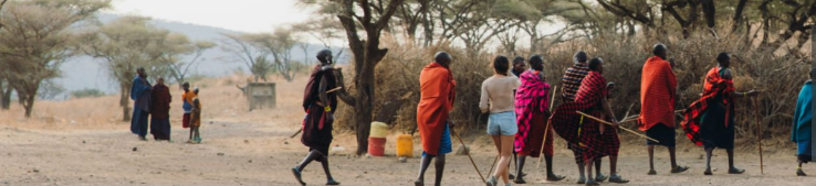 Maasai cultural tour in Kenya, traditional attire and dance display.